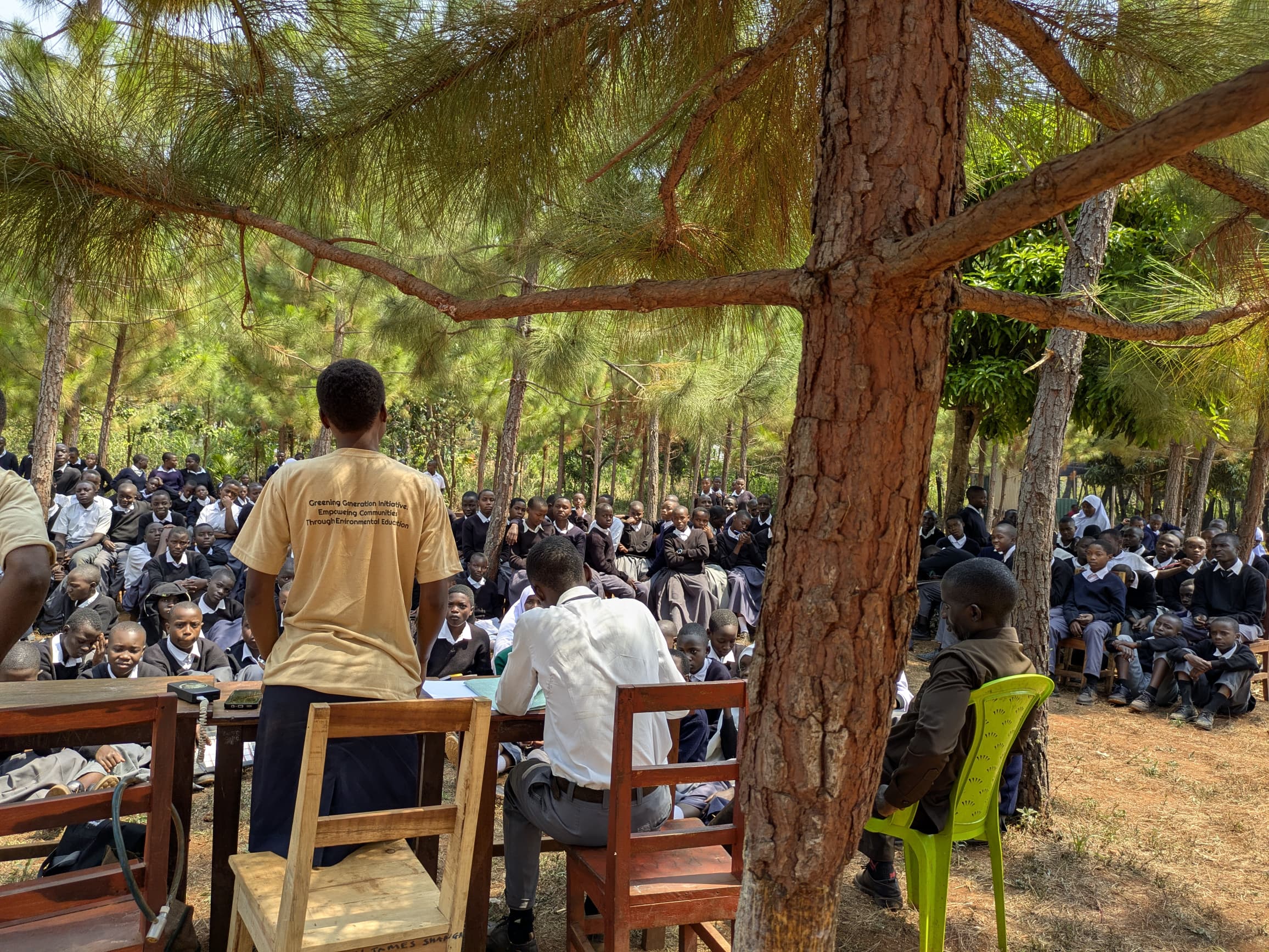 EarthCare Foundation community climate education session under trees