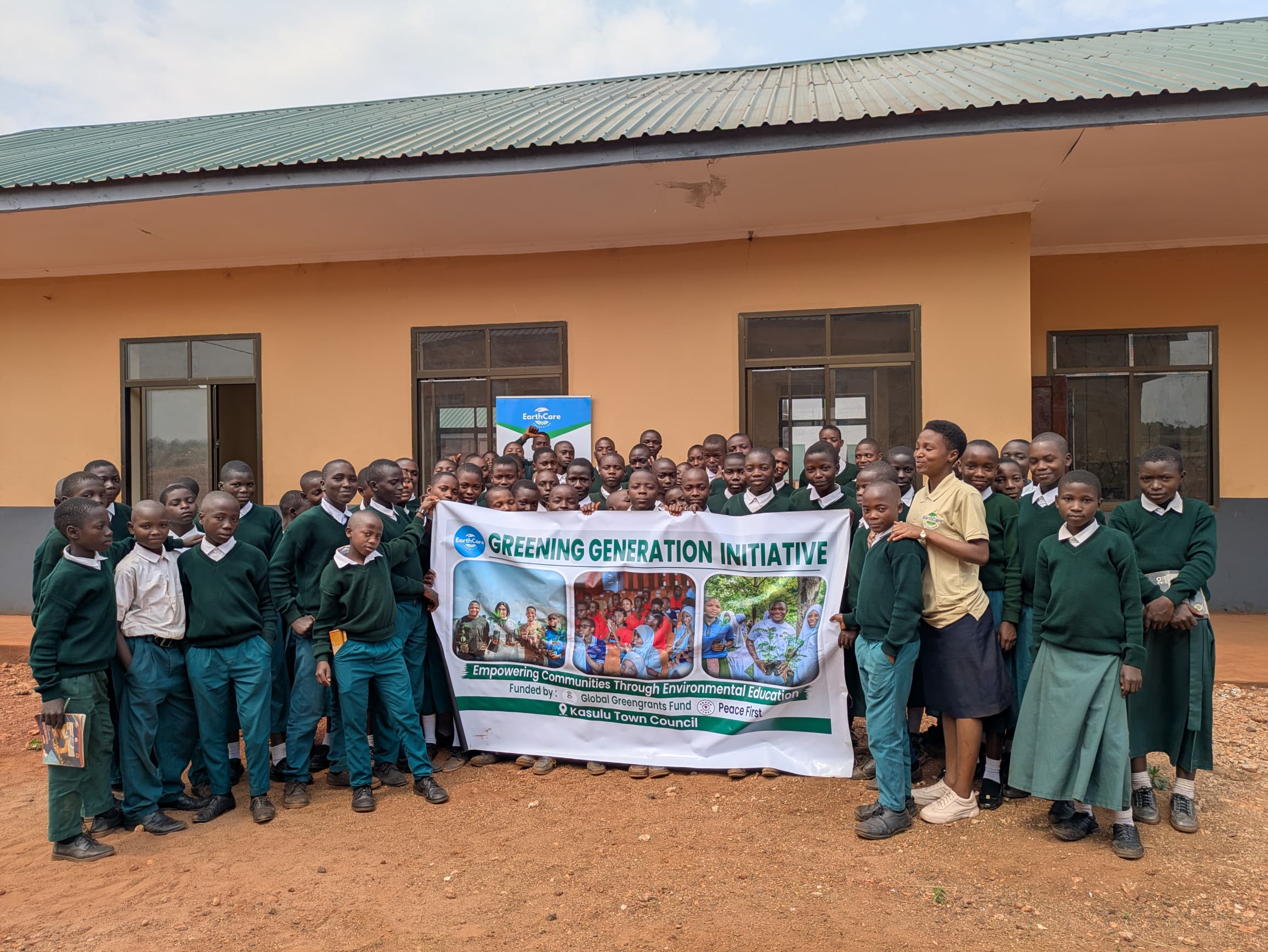 Students with the Greening Generation Initiative banner